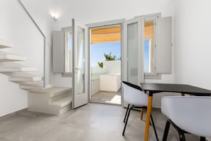 Family Room, 2 Bedrooms (Outdoor Jet Tub) | Living area | 42-inch flat-screen TV with satellite channels, TV - SERAPIAS SUITES (Santorini)
