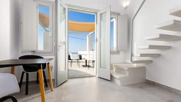 Family Suite, 2 Bedrooms (Outdoor Jet Tub) | Living area | 42-inch flat-screen TV with satellite channels, TV