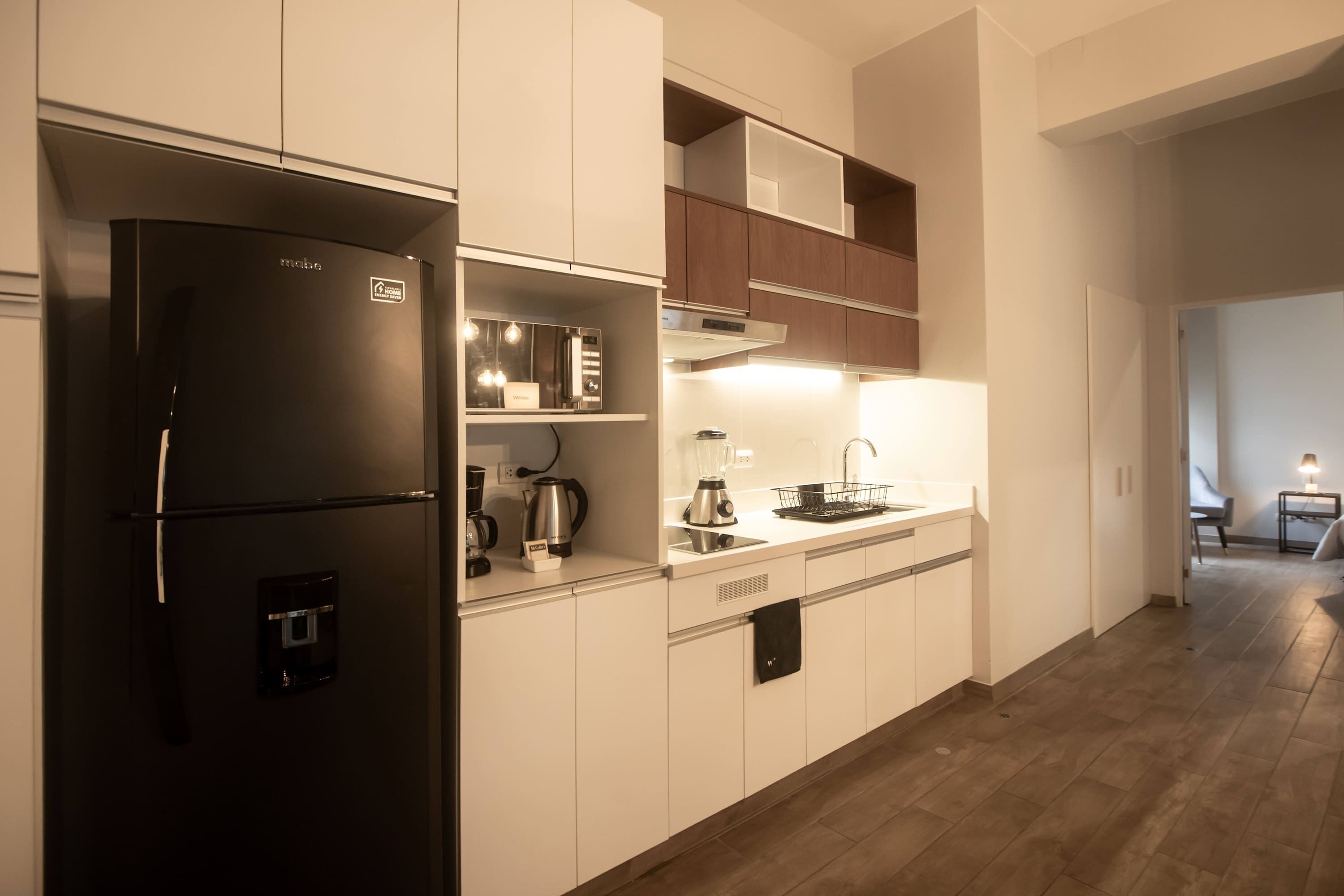 Fridge, microwave, stovetop, coffee/tea maker