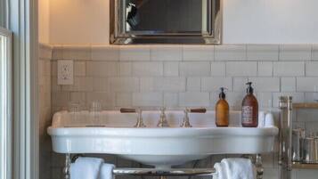 Bathtub, hair dryer, towels