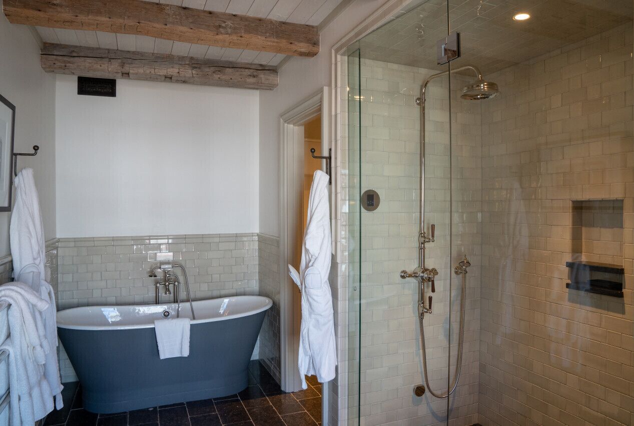 Bathtub, hair dryer, towels, soap