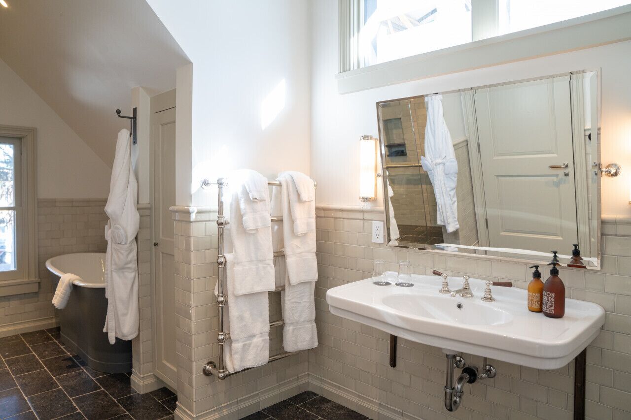 Bathtub, hair dryer, towels