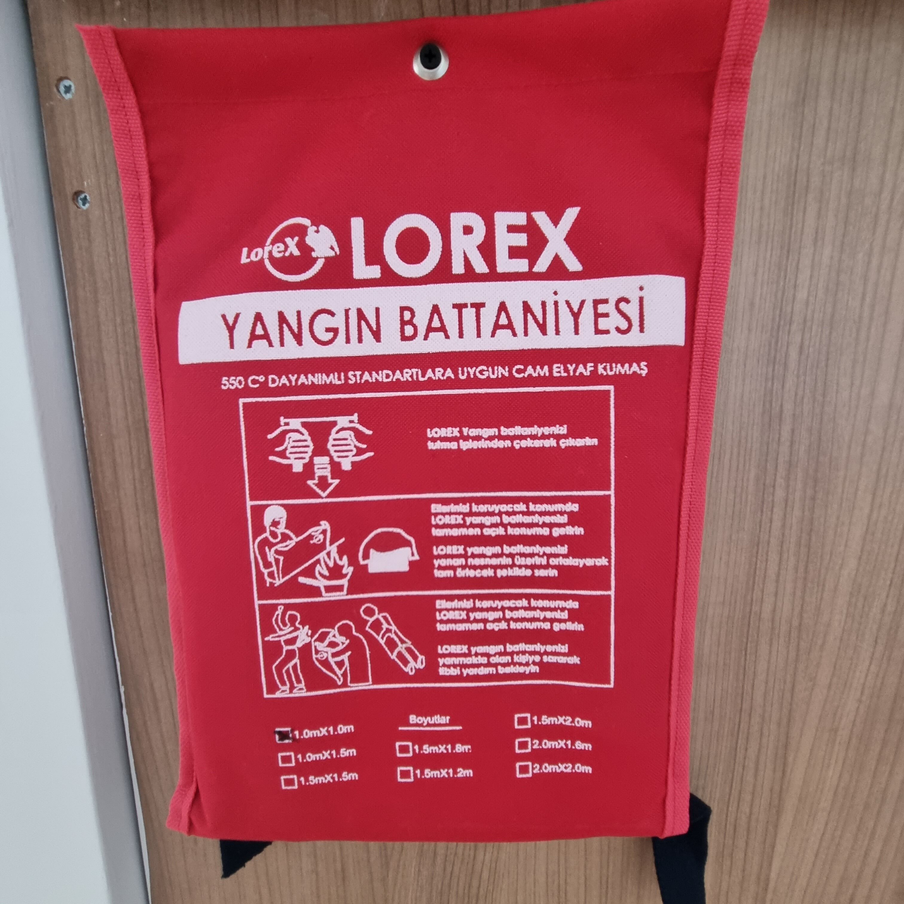 A red bag with the text "LOREX YANGIN BATTANIYESI" and instructions for use.
