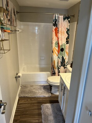 Combined shower/tub