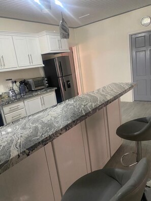 Superior Apartment | Private kitchen | Fridge, microwave, oven, stovetop - Tranquility Suites- Feels like home (Choiseul)