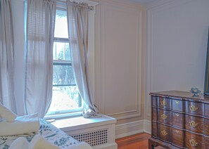 1 bedroom, desk, iron/ironing board, travel crib