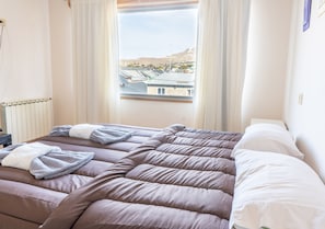 Standard Room | Bed sheets - Hotel Ñuke Piren (Caviahue)