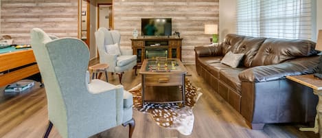 Smart TV, fireplace, video games, foosball