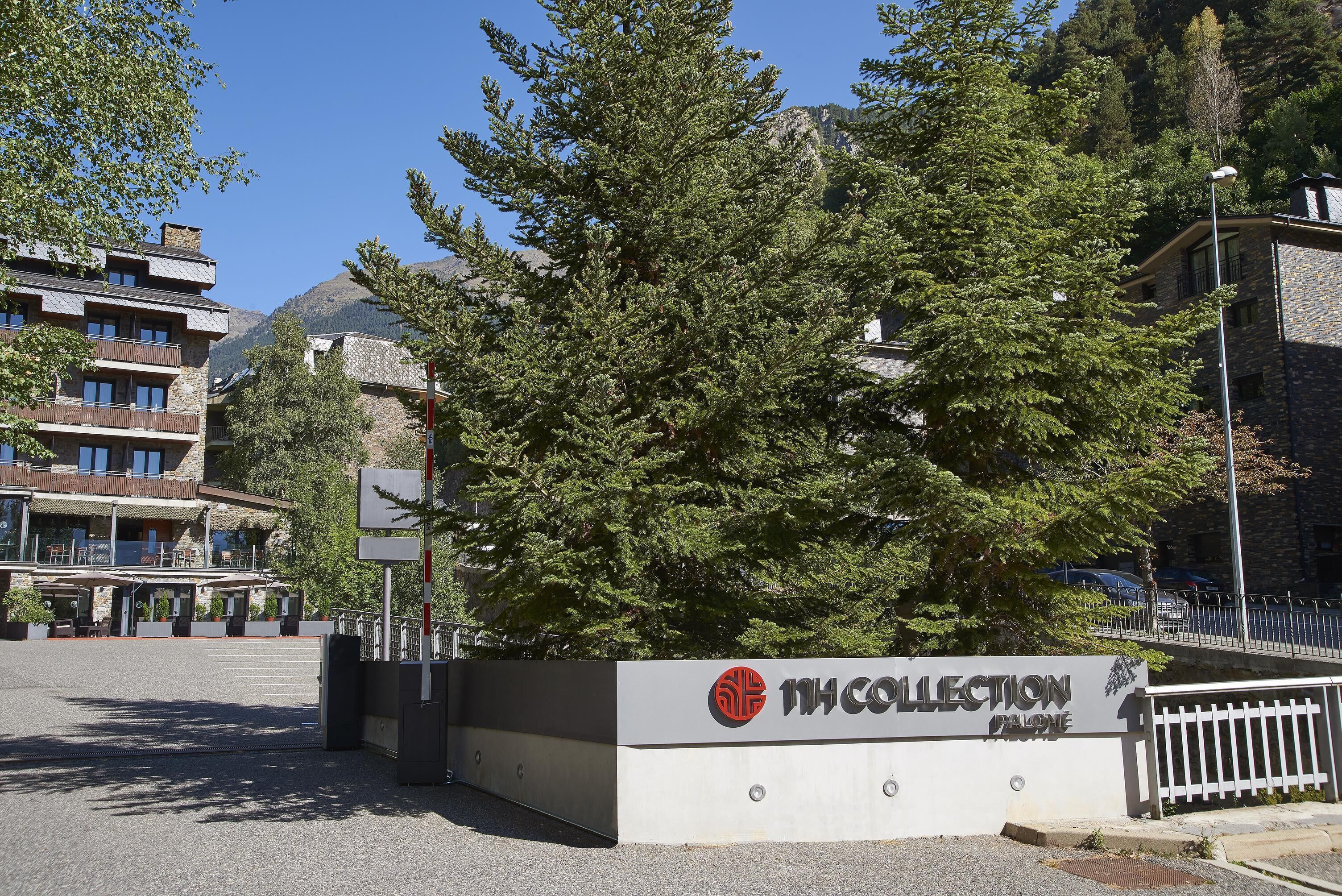 A building with a sign reading "Collection Hotel."