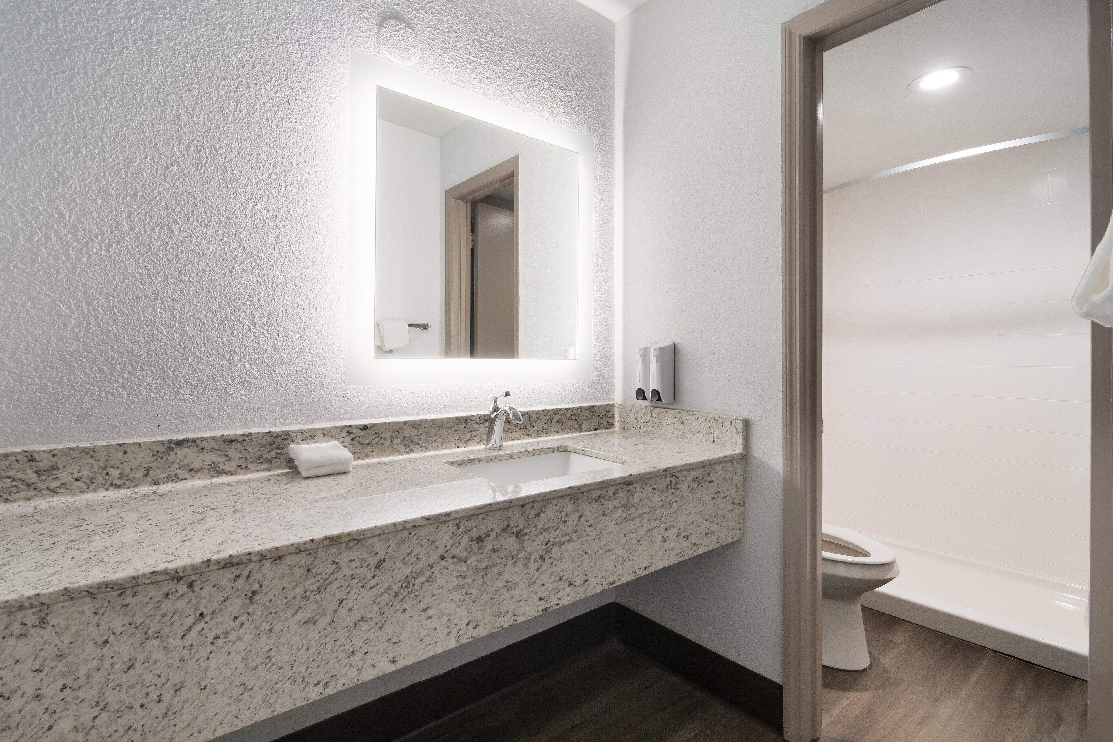 Combined shower/tub, towels, soap, shampoo