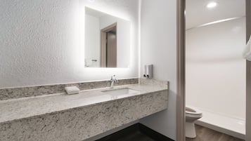 Combined shower/tub, towels, soap, shampoo