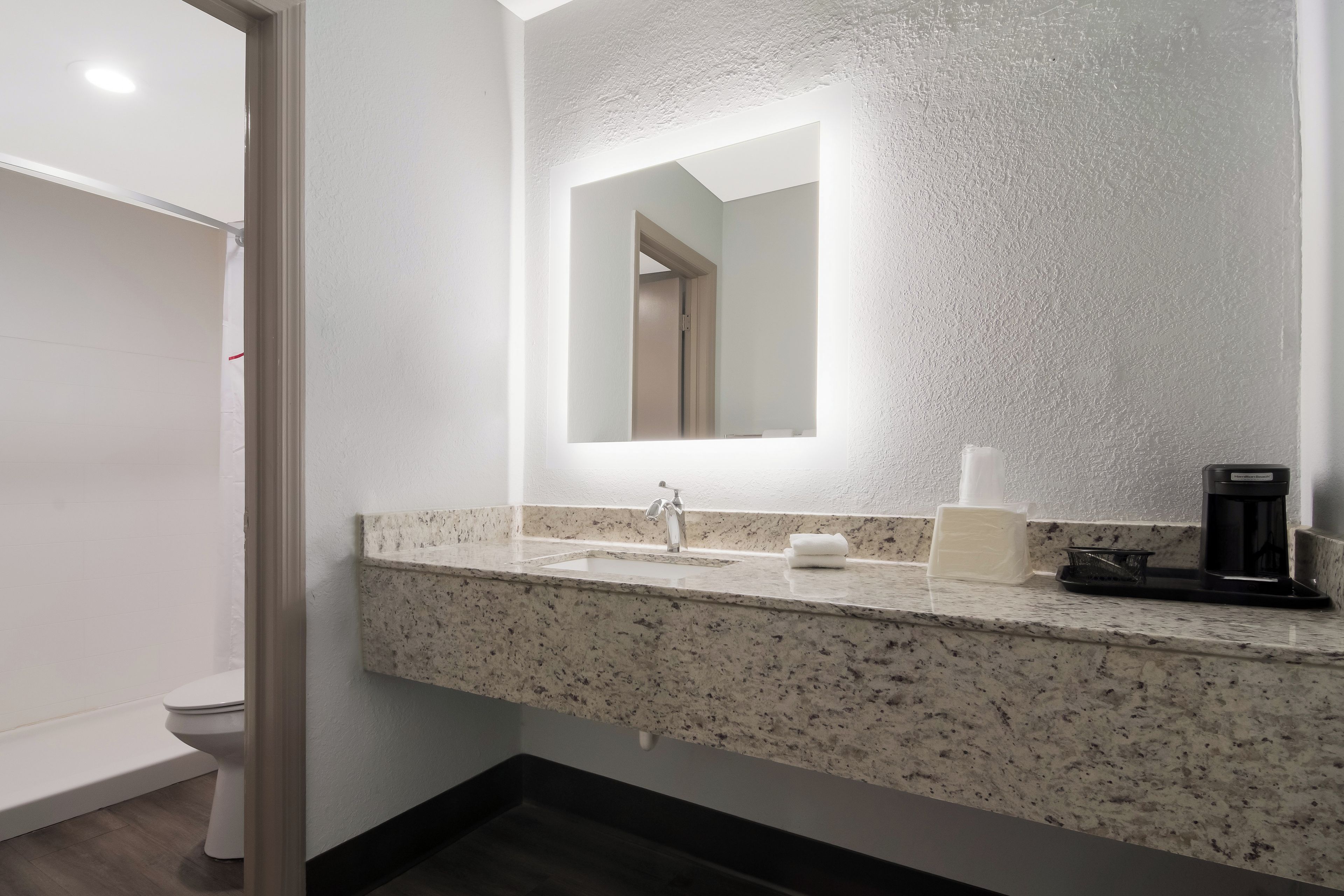 Combined shower/tub, towels, soap, shampoo