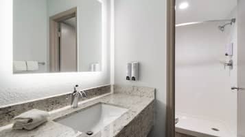 Combined shower/tub, towels, soap, shampoo