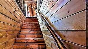 Staircase leads to a door at the top.