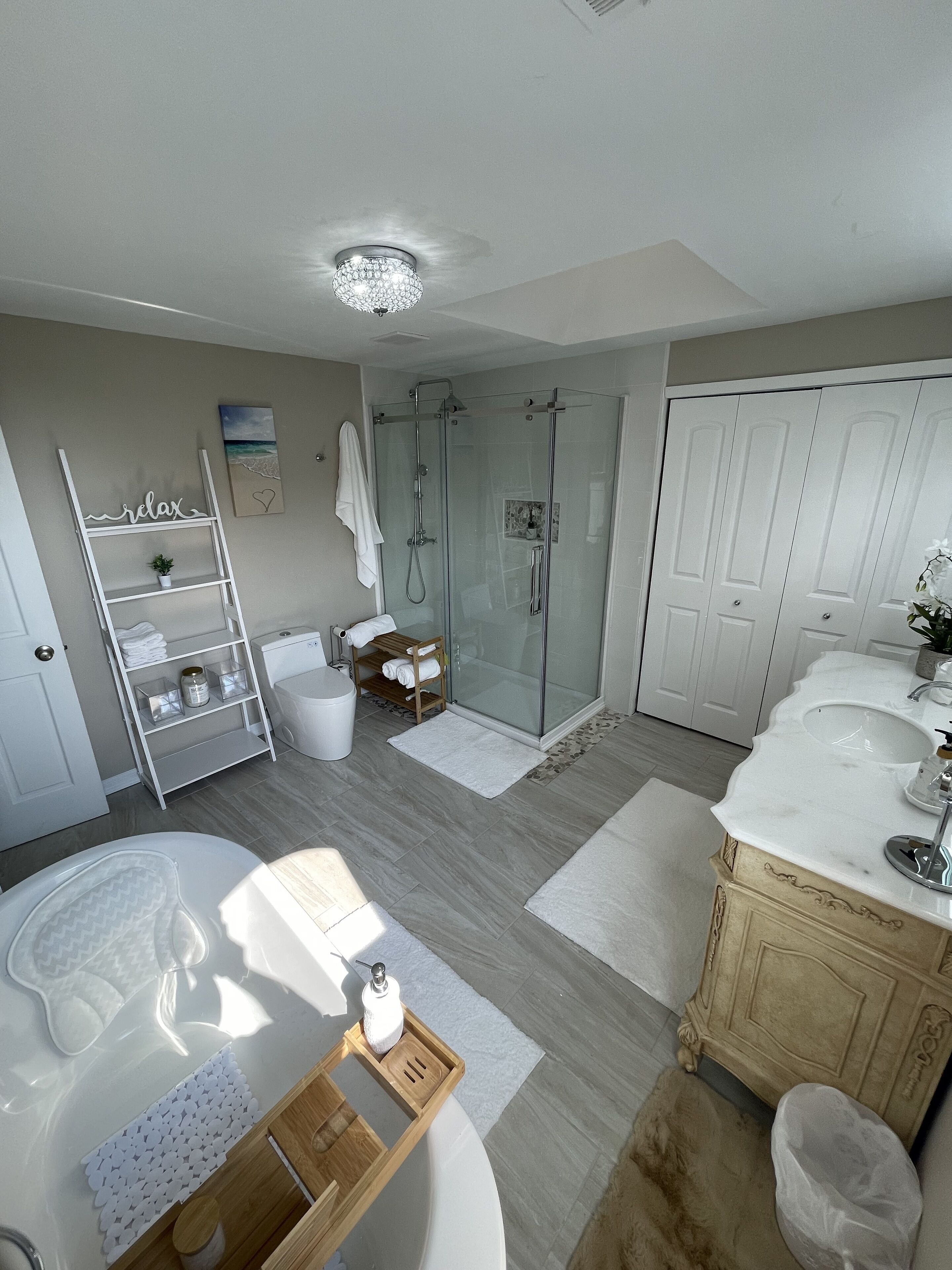 Bathtub, hair dryer, towels, soap