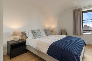 2 slaapkamers, een strijkplank/strijkijzer, gratis wifi, beddengoed