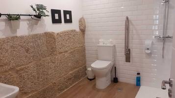 Shower, hair dryer, towels, toilet paper