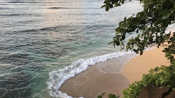 On the beach, sun-loungers, beach towels