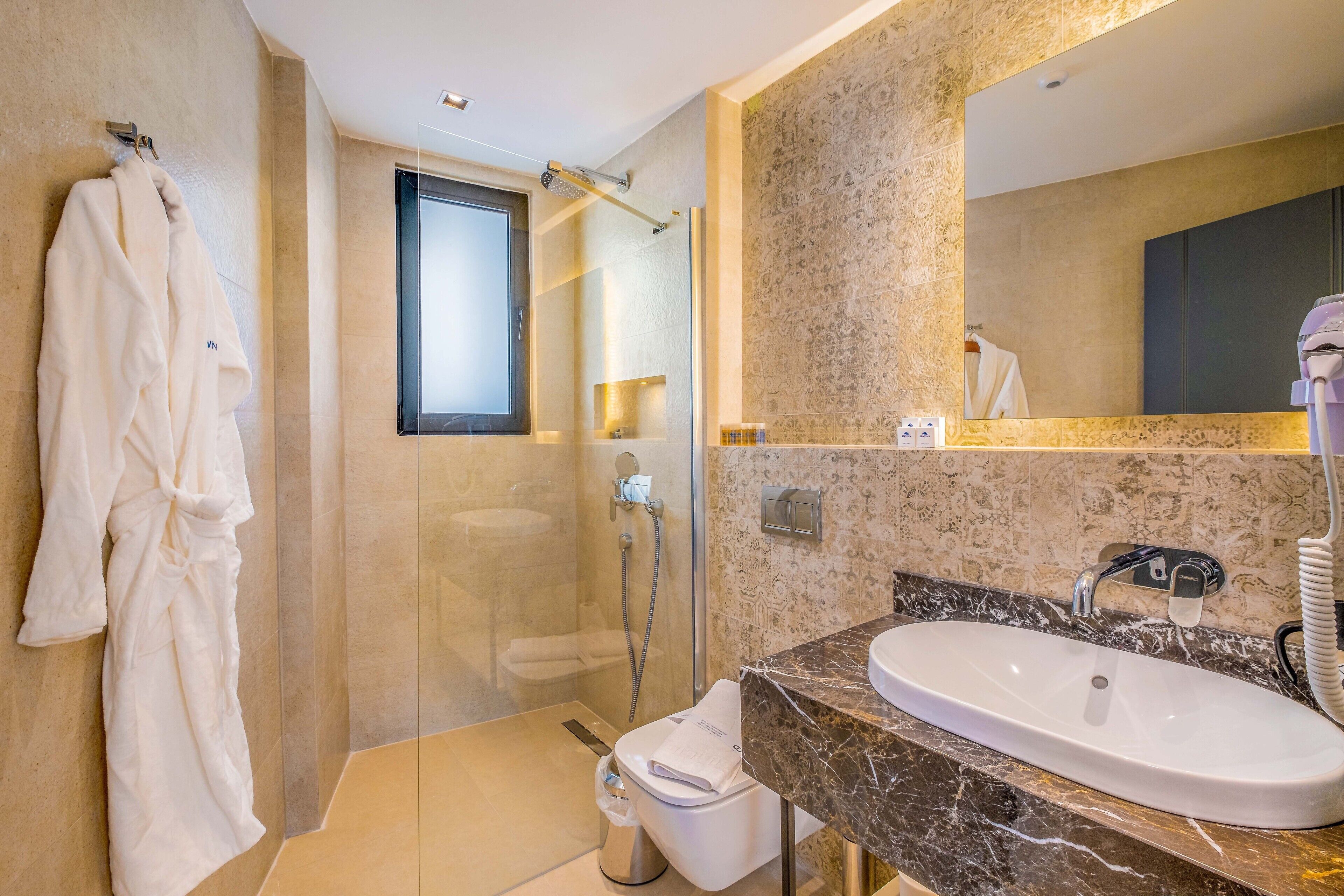Shower, free toiletries, hair dryer, slippers