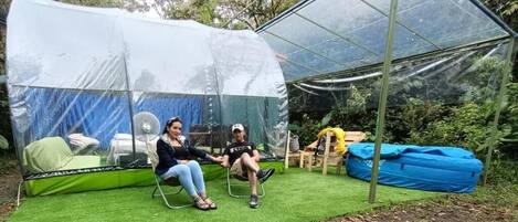 Family Room, Mountain View | Minibar, individually decorated, individually furnished, bed sheets