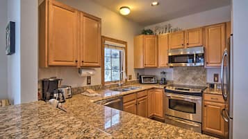 Dishwasher, coffee/tea maker, dining tables