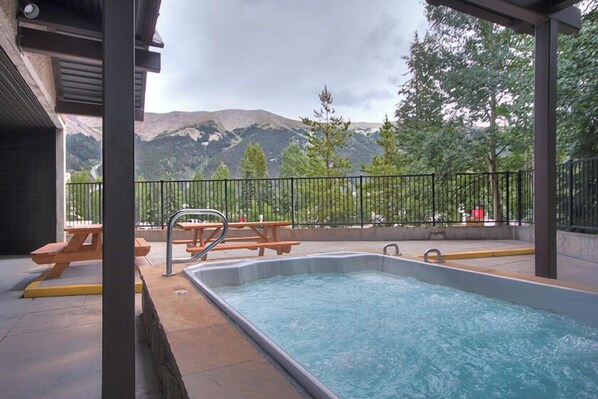 Relax by the pool with a breathtaking view of the surrounding mountains.