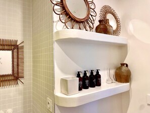 Shower, hair dryer, towels, toilet paper