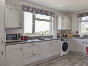 Dishwasher, high chair - 4 bedroom accommodation in Dyffryn Ardudwy, near Harlech (Dyffryn Ardudwy, near Harlech)
