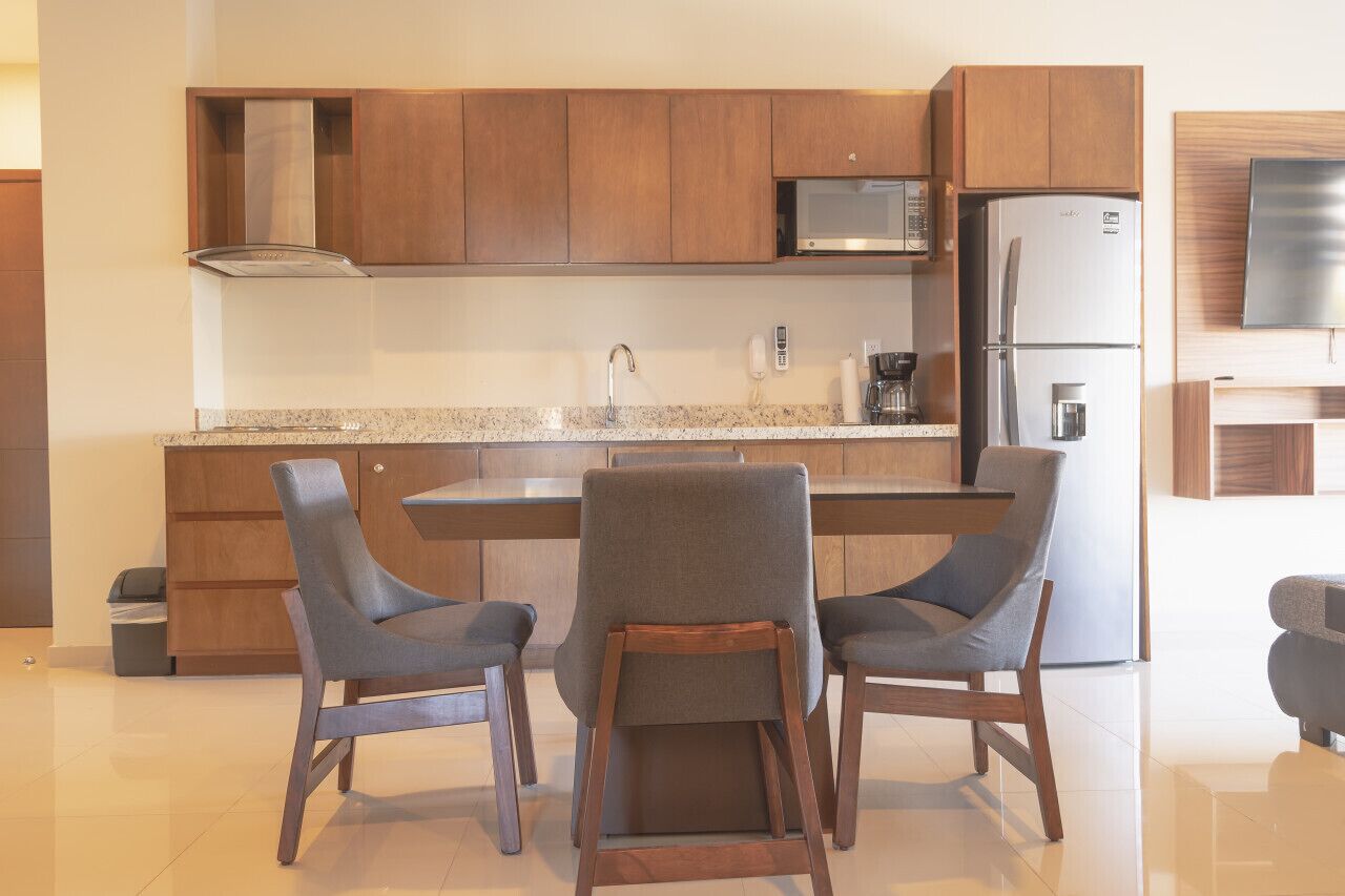 Fridge, microwave, stovetop, coffee/tea maker