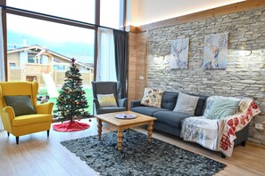 Superior Chalet, 3 Bedrooms, Sauna, Mountain View | Living area | 100-cm TV with satellite channels, fireplace