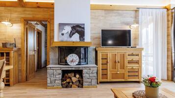 Superior Chalet, 3 Bedrooms, Sauna, Mountain View | Living area | 100-cm TV with satellite channels, fireplace