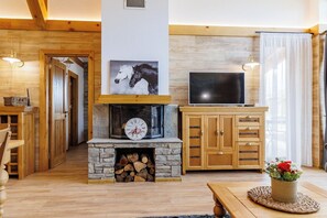 Superior Chalet, 3 Bedrooms, Sauna, Mountain View | Living area | 100-cm TV with satellite channels, fireplace