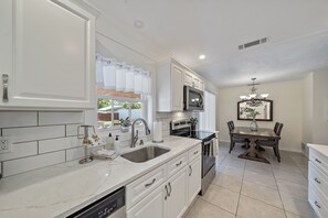 Fridge, microwave, oven, stovetop - Dean Ave | Screened-In Porch, Patio + Yard Games! (Sarasota)