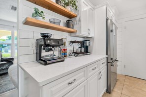 Fridge, microwave, oven, stovetop - Honey Glow Bungalow  | Screened-In Porch, Patio + Yard Games! (Sarasota)