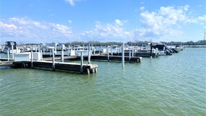 A marina with multiple docks and boats.