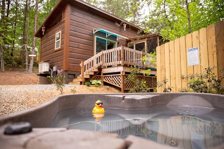 Outdoor spa tub. Serenity Ridge Cabin A: Couple's Getaway + Hot Tub