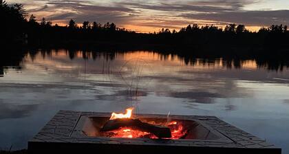 Lakefront family getaway;large dock;private boat ramp;Pretty cottage;large deck!