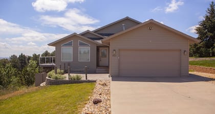 Immaculate modern home with stunning views nestled into a beautiful valley.