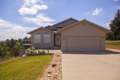 Immaculate modern home with stunning views nestled into a beautiful valley. 