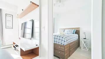 1 bedroom, desk, iron/ironing board, travel cot