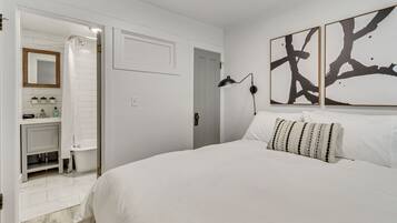 1 bedroom, desk, iron/ironing board, travel crib