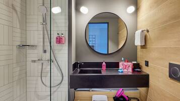 Shower, hair dryer, towels, soap