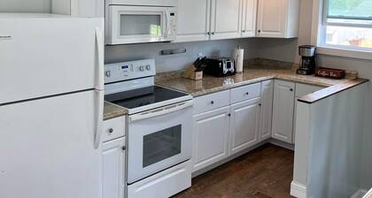 Ranch home with 3 bedrooms upstairs and 1 down. Refurnished June of 2022