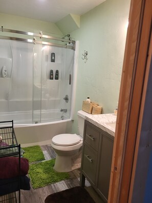 Combined shower/tub, jetted tub