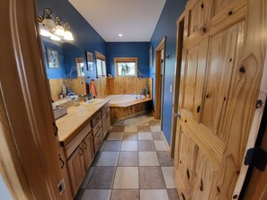 Combined shower/tub, jetted tub