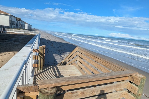 On the beach, sun loungers, beach towels