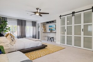 1 bedroom, desk, iron/ironing board, travel crib