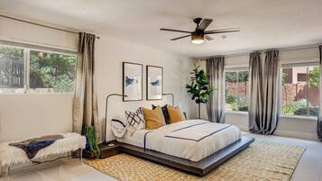 1 bedroom, desk, iron/ironing board, travel crib