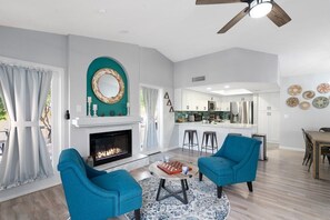 Smart TV, fireplace, video game console, books