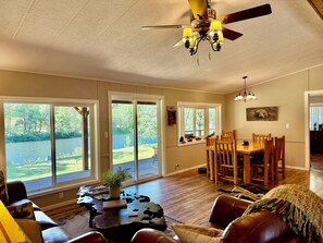 Dining - Riverfront Gem with Big Deck, Fishing & Adventure. Comfy beds, upgraded beauty (Trail)